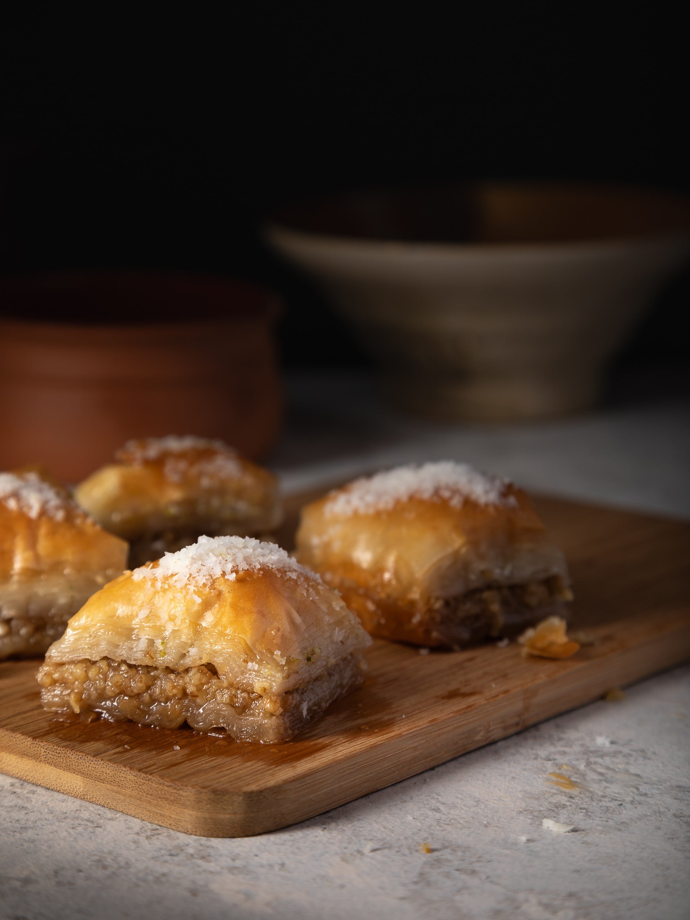 Sweet sticky Turkish baclava served on a board and photographed by Steve Wickenton